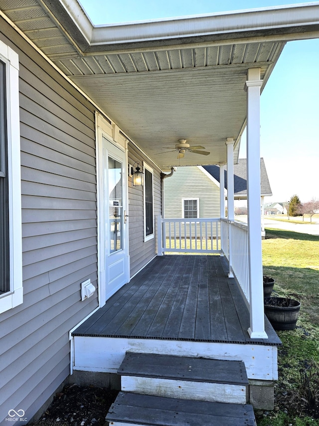 wooden deck with ceiling fan