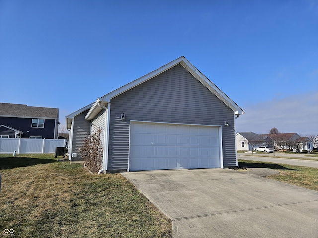 view of property exterior with a garage, a lawn, and central air condition unit