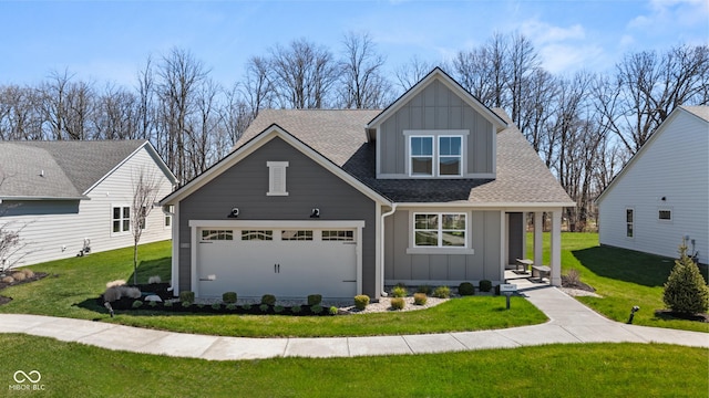 view of front of home featuring a shingled roof, a front lawn, and board and batten siding