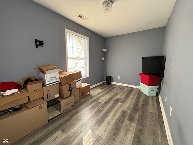 miscellaneous room featuring dark hardwood / wood-style floors