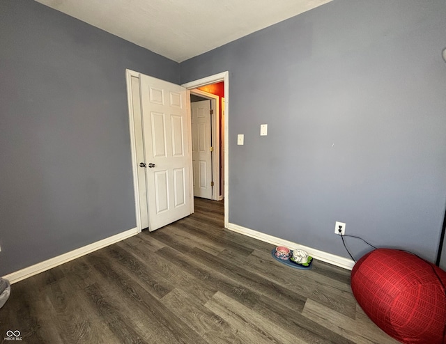 interior space with dark wood-type flooring