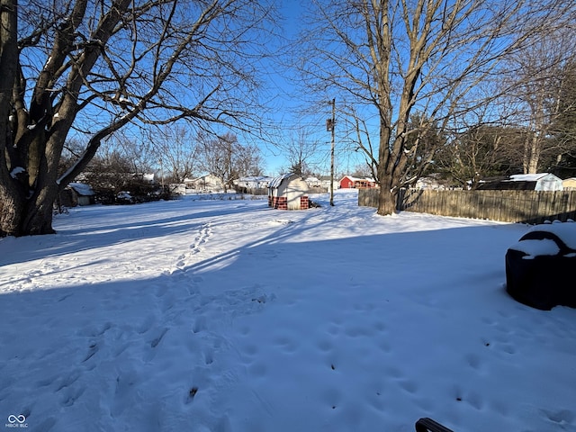 view of yard covered in snow