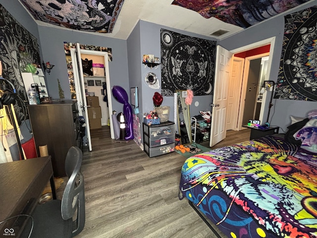 bedroom featuring hardwood / wood-style floors