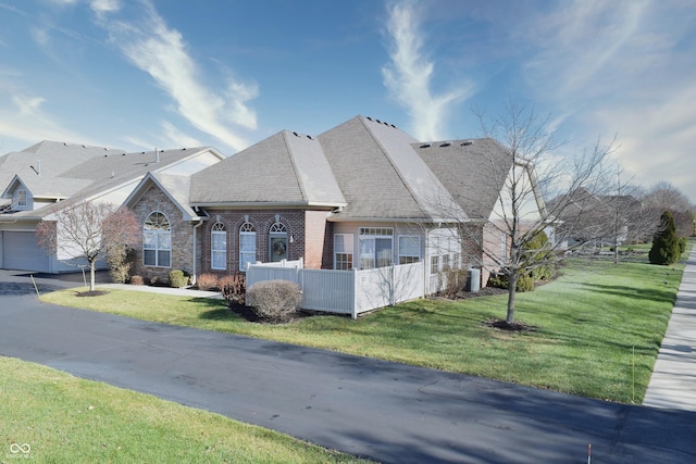 view of front of property with a front lawn