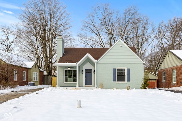 view of front of house featuring ceiling fan and central air condition unit