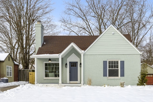 view of front of property featuring central AC unit and ceiling fan