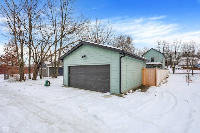 view of snow covered garage