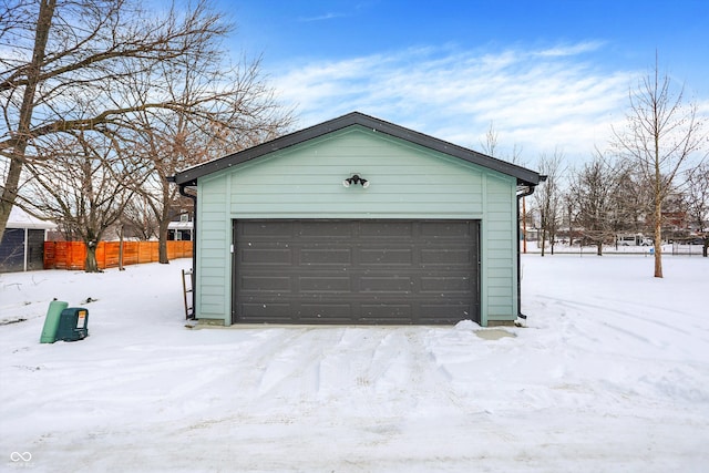 view of snow covered garage