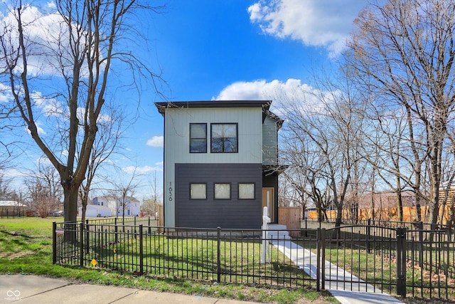 1656 Roosevelt Ave, Indianapolis, IN 46218 - view of front of home featuring a fenced front yard and a front lawn