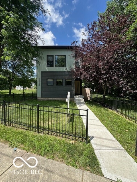 1656 Roosevelt Ave, Indianapolis, IN 46218 - modern home with a fenced front yard