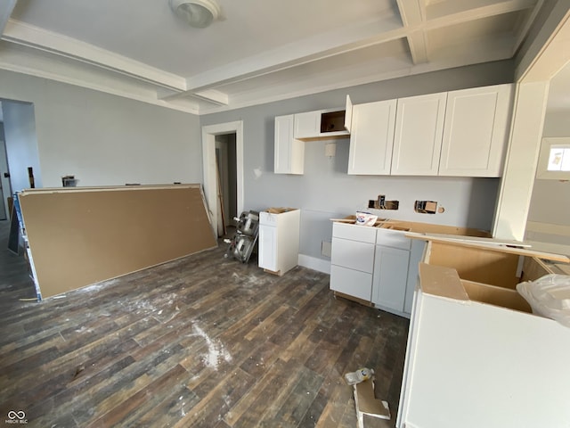 kitchen with coffered ceiling, white cabinets, and dark wood-type flooring