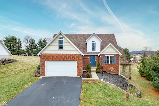 view of front facade with a garage and a front lawn