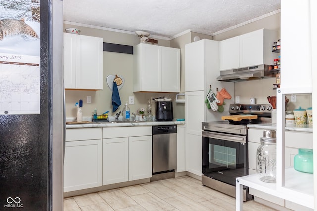 kitchen with stainless steel appliances, a textured ceiling, ornamental molding, white cabinets, and sink