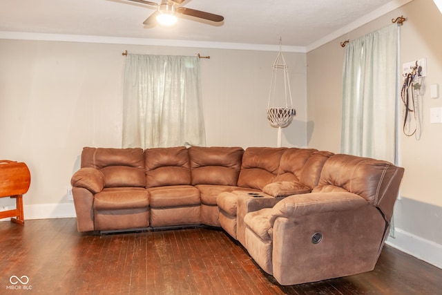 living room with ceiling fan, dark wood-type flooring, and crown molding