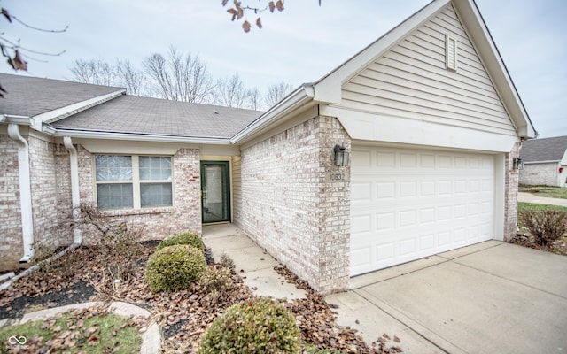 single story home with a garage