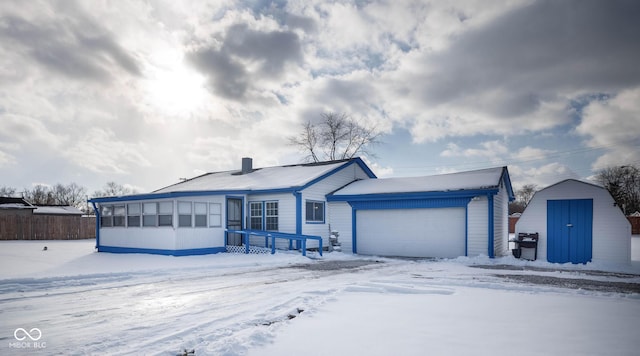 single story home featuring a garage