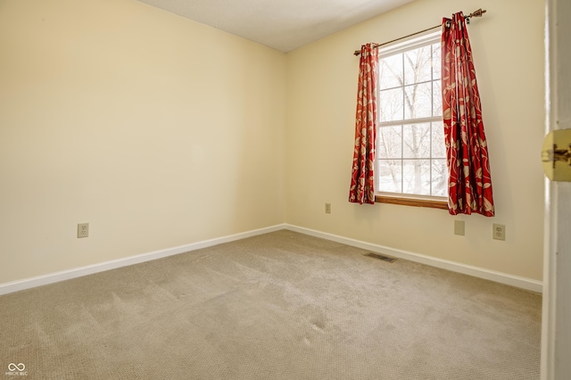 view of carpeted spare room