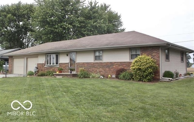 ranch-style house with a garage and a front lawn