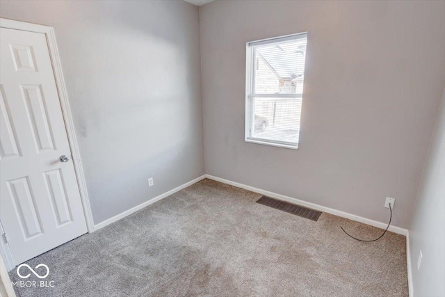 view of carpeted spare room