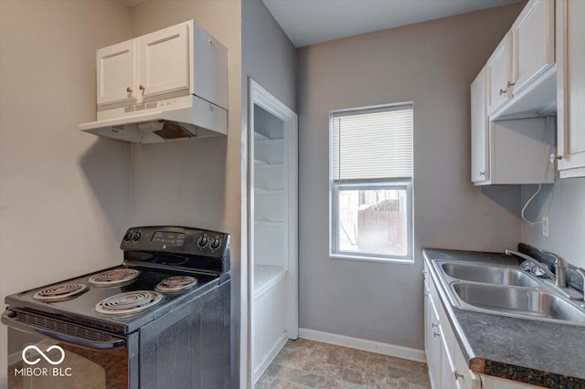 kitchen with white cabinetry, sink, and electric range