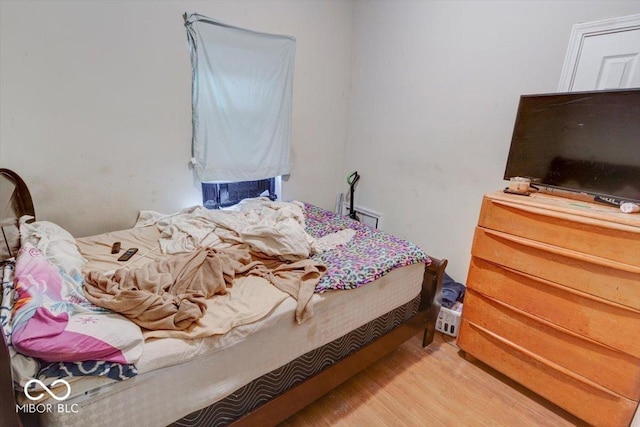 bedroom featuring light hardwood / wood-style floors