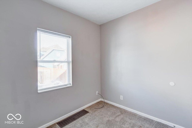 view of carpeted spare room