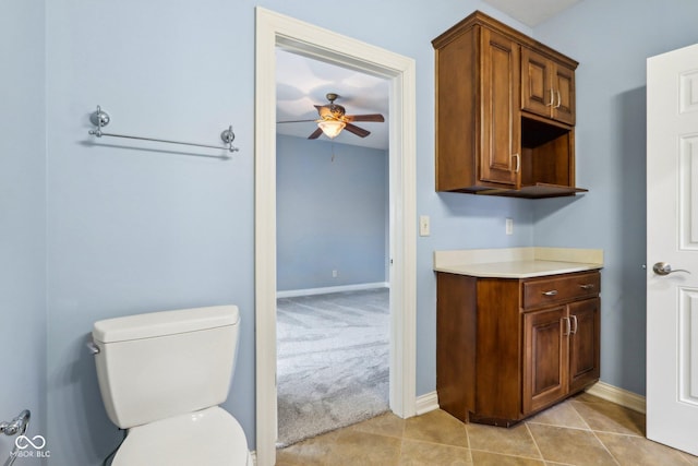 kitchen featuring light tile patterned flooring and ceiling fan