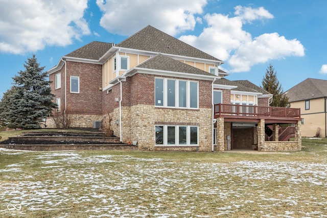 snow covered property featuring a deck