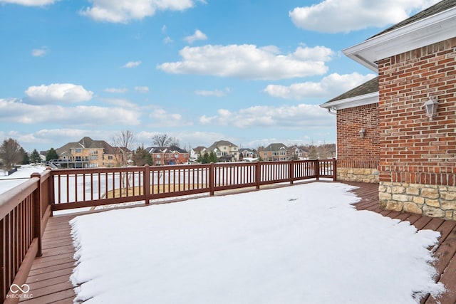 view of snow covered deck