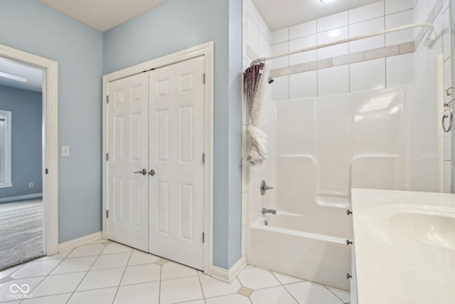 bathroom featuring shower / bath combo, tile patterned floors, and vanity