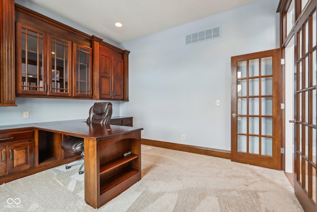 home office with light carpet