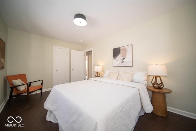 bedroom featuring dark hardwood / wood-style floors