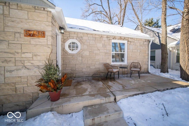 view of snow covered patio