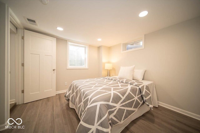 bedroom featuring dark wood-type flooring