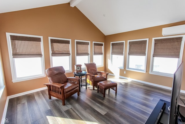 living area with beamed ceiling, dark hardwood / wood-style flooring, a wall mounted AC, and high vaulted ceiling