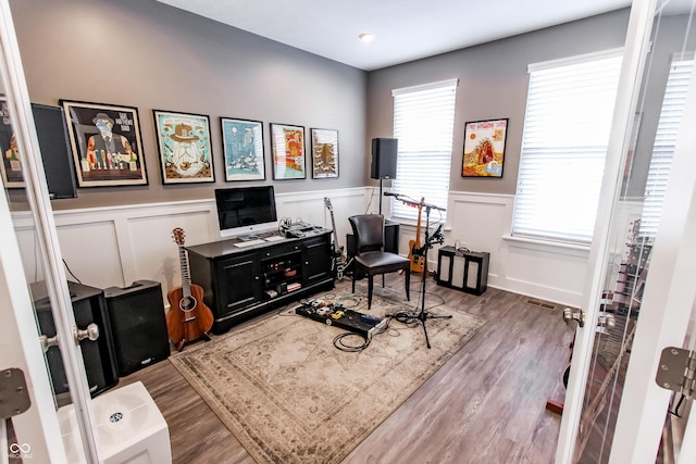 home office featuring hardwood / wood-style flooring