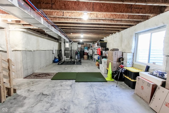 basement featuring heating unit