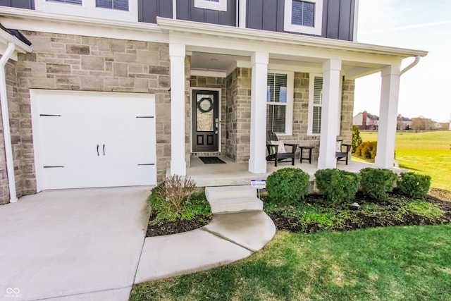 property entrance with a garage and covered porch