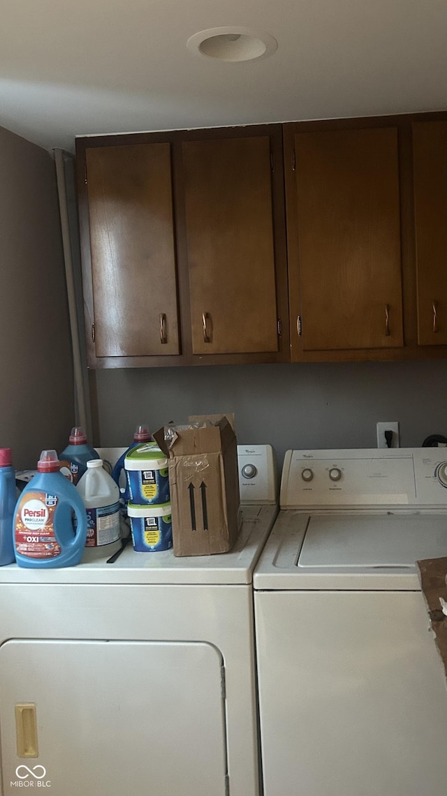 laundry area with cabinets and washer and dryer