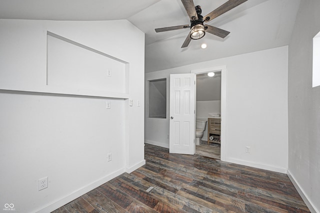 unfurnished room with ceiling fan, dark hardwood / wood-style flooring, and vaulted ceiling