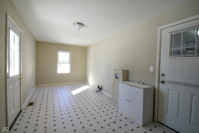 laundry room with a healthy amount of sunlight and hookup for a washing machine