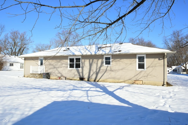 view of snow covered property