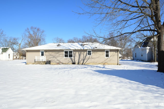 view of snow covered house