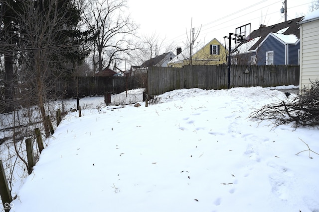 view of yard covered in snow