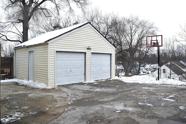 view of snow covered garage