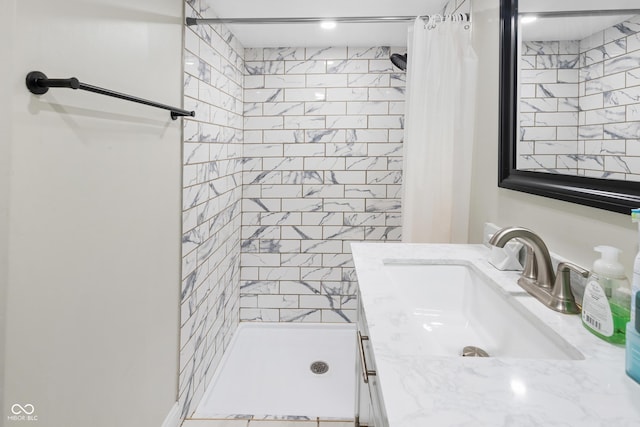 bathroom featuring vanity and walk in shower