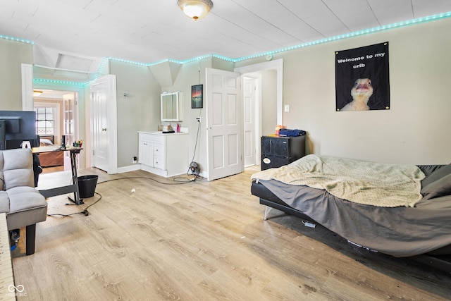 bedroom with light hardwood / wood-style flooring