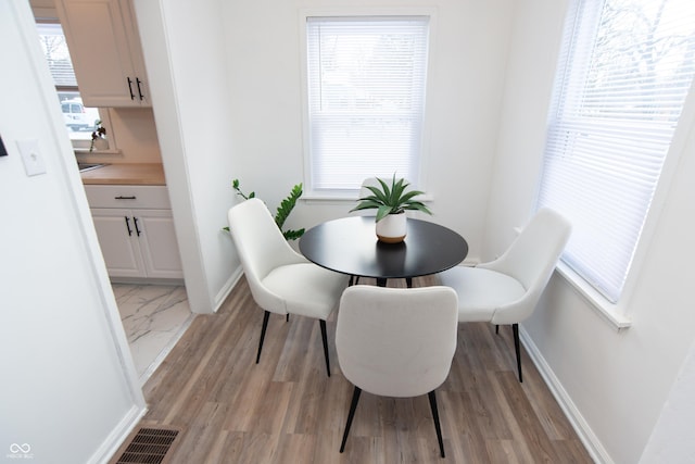 dining area featuring light hardwood / wood-style flooring