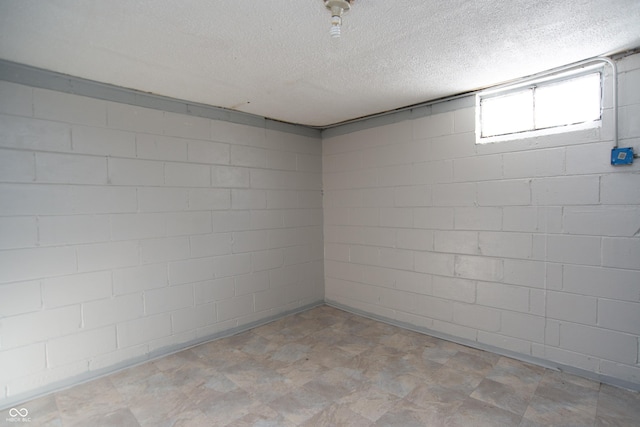 basement with a textured ceiling