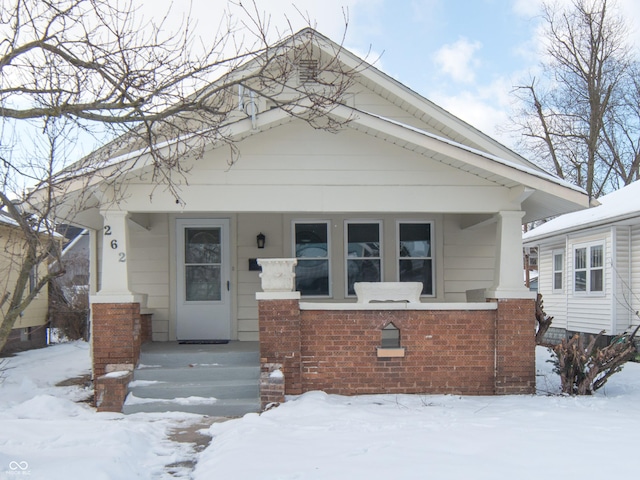 view of front of property featuring covered porch